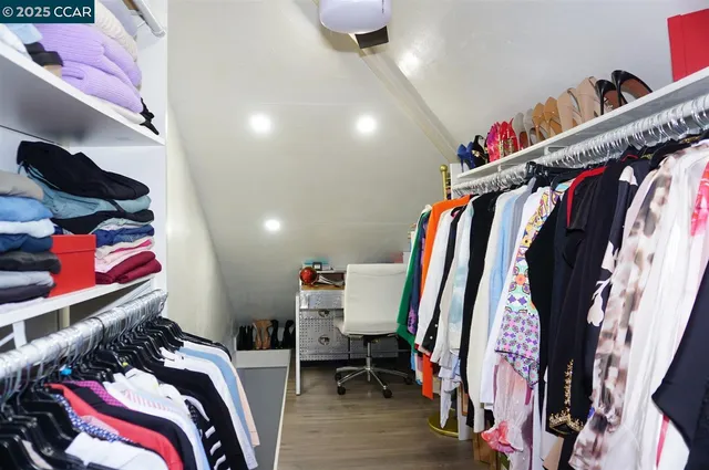 a room with furniture and a wooden floor