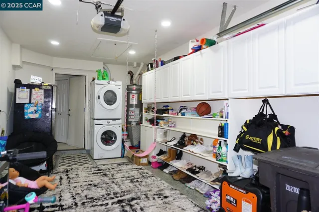 a view of residential house with outdoor space and lake view