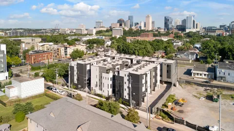 a view of a city with tall buildings