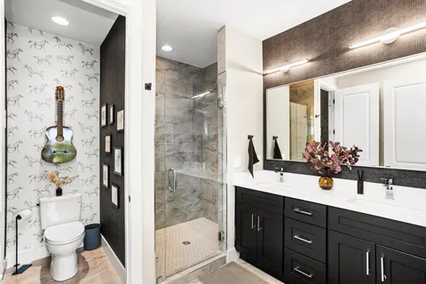a living room with furniture fireplace and a flat screen tv
