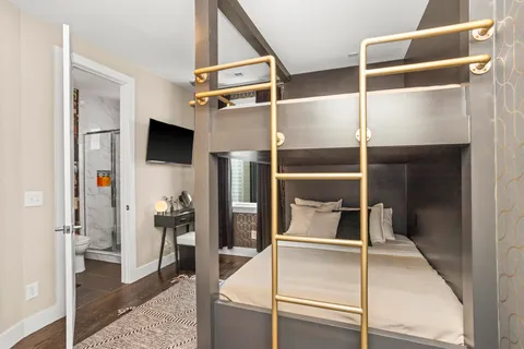 a bathroom with a sink toilet and vanity