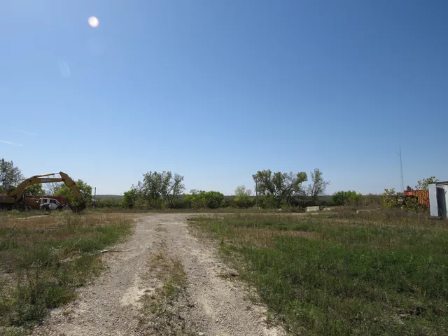 a view of a lake with green space