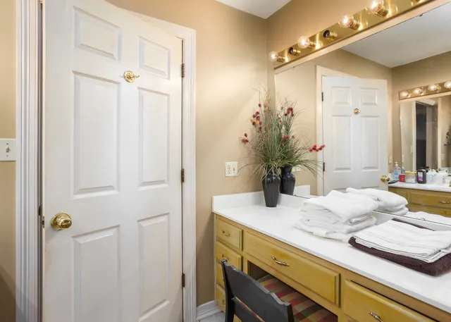 a room with furniture and pool table