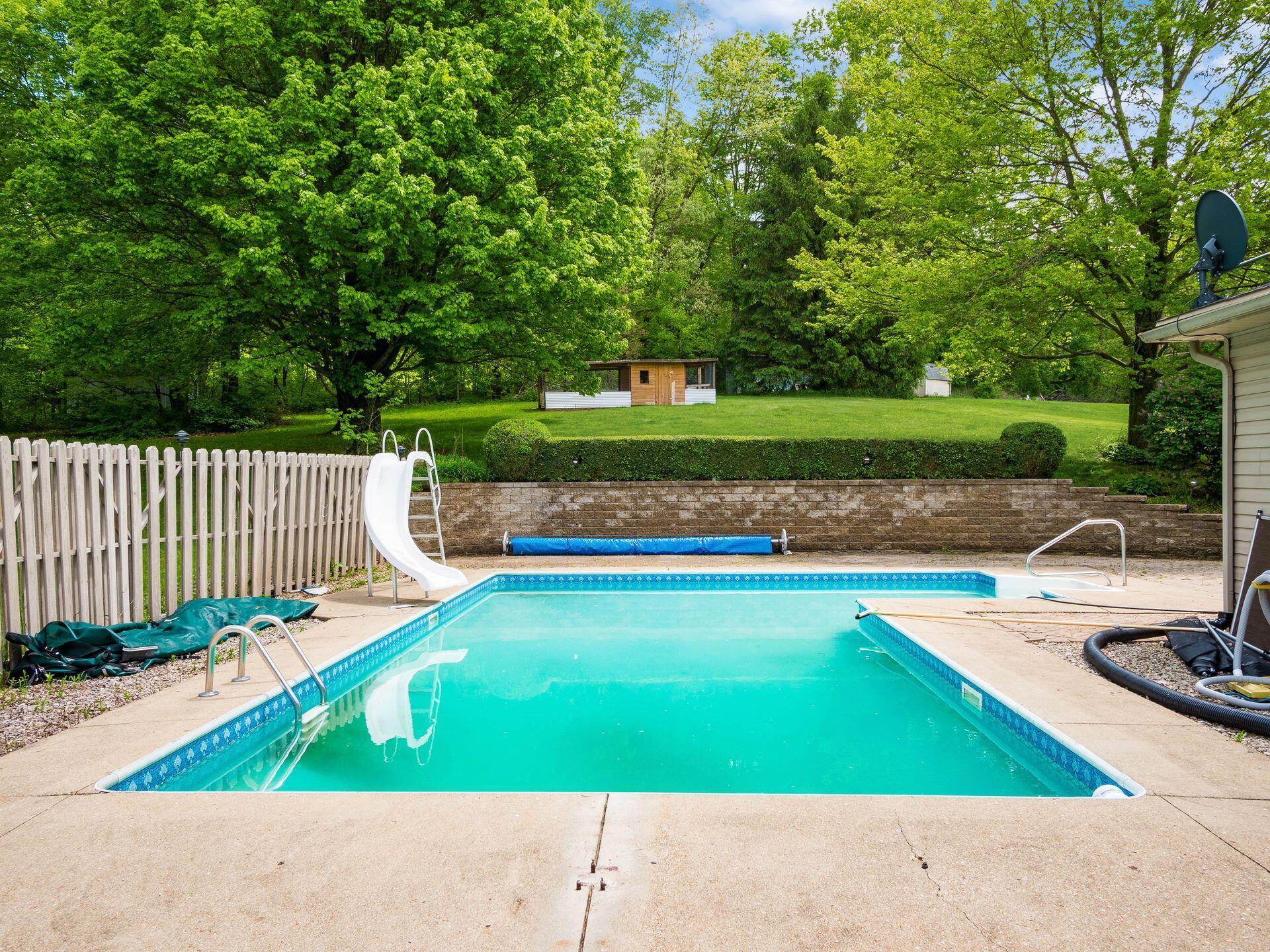 14288 Wooster Road Mount Vernon, OH 43050 - Photo 43 of 45 Pool and backyard w/ chicken coop