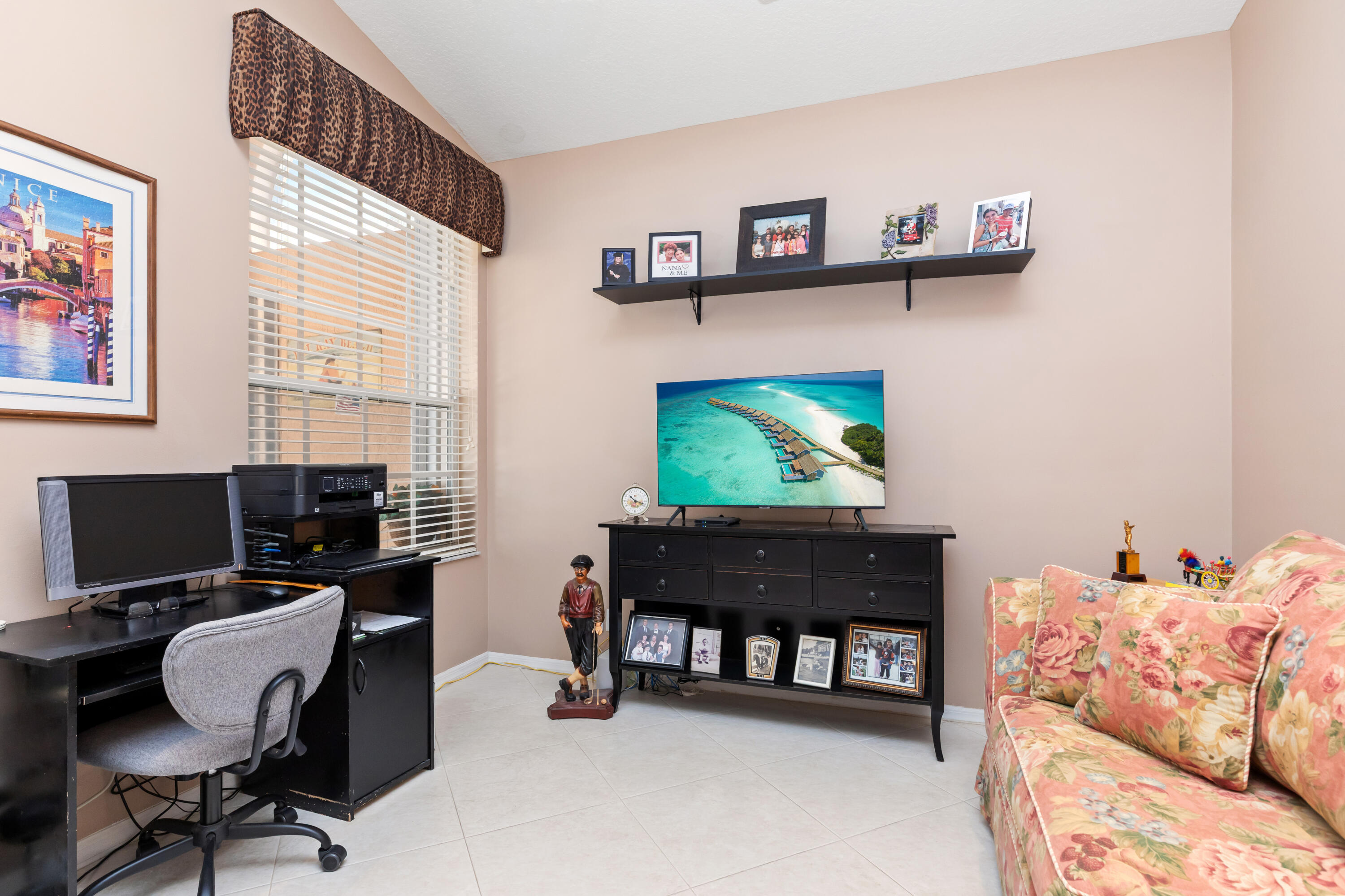 6698 Vía Roma Delray Beach, FL 33446 - Photo 17 of 50 a view of a livingroom with workspace and a couch