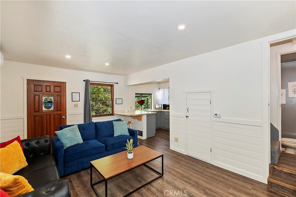 1262 Bear Springs Road Rimforest, CA 92378 - Photo 11 of 34 a living room with furniture and a window
