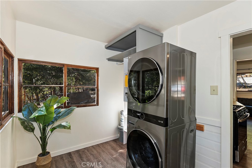 1262 Bear Springs Road Rimforest, CA 92378 - Photo 19 of 34 a view of entryway with washer and dryer
