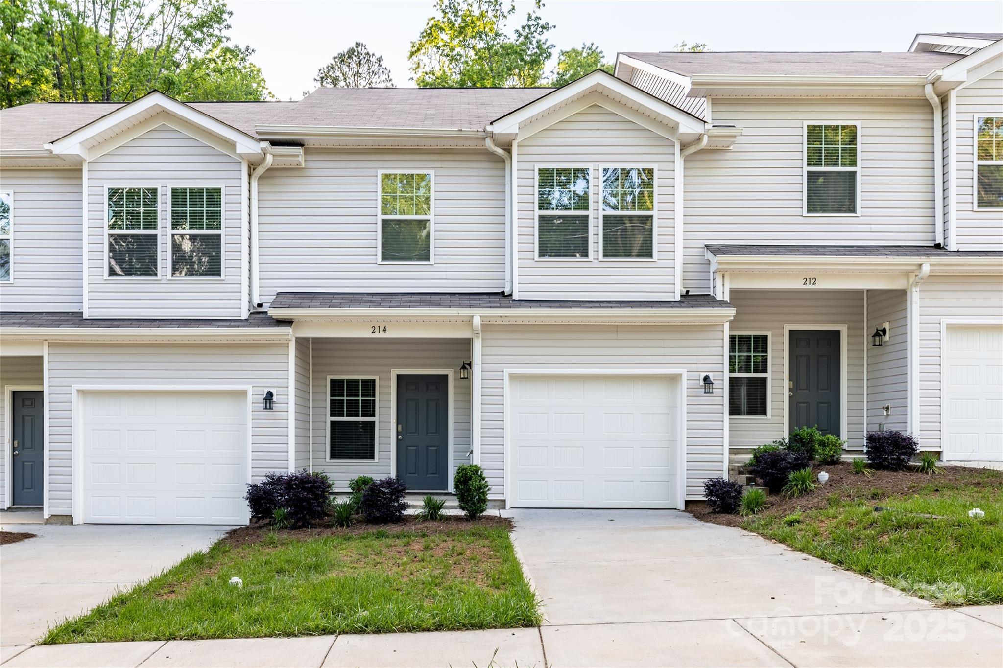 front view of a house and a yard