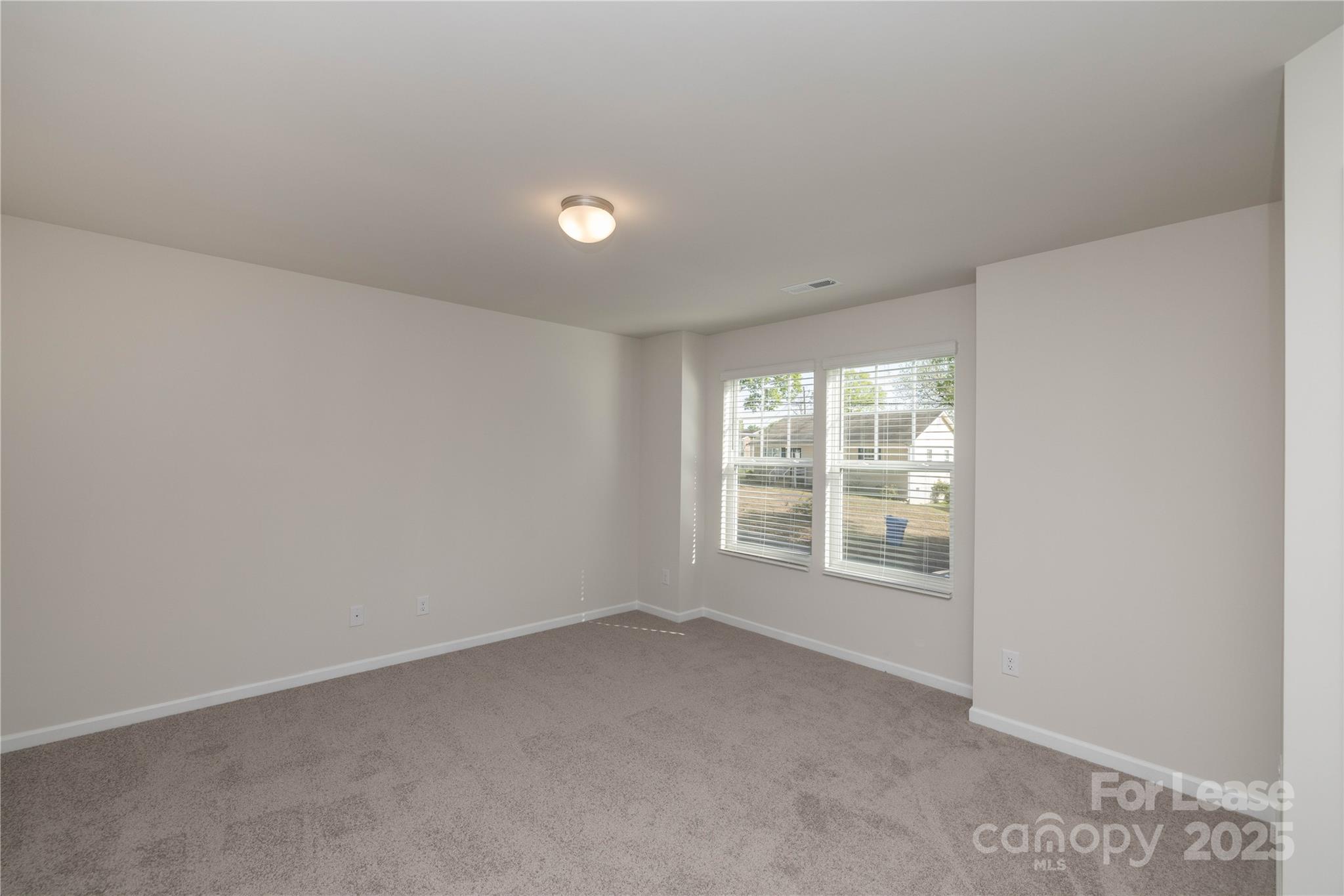 146 South Bell Avenue Albemarle, NC 28001 - Photo 20 of 36 an empty room with a window