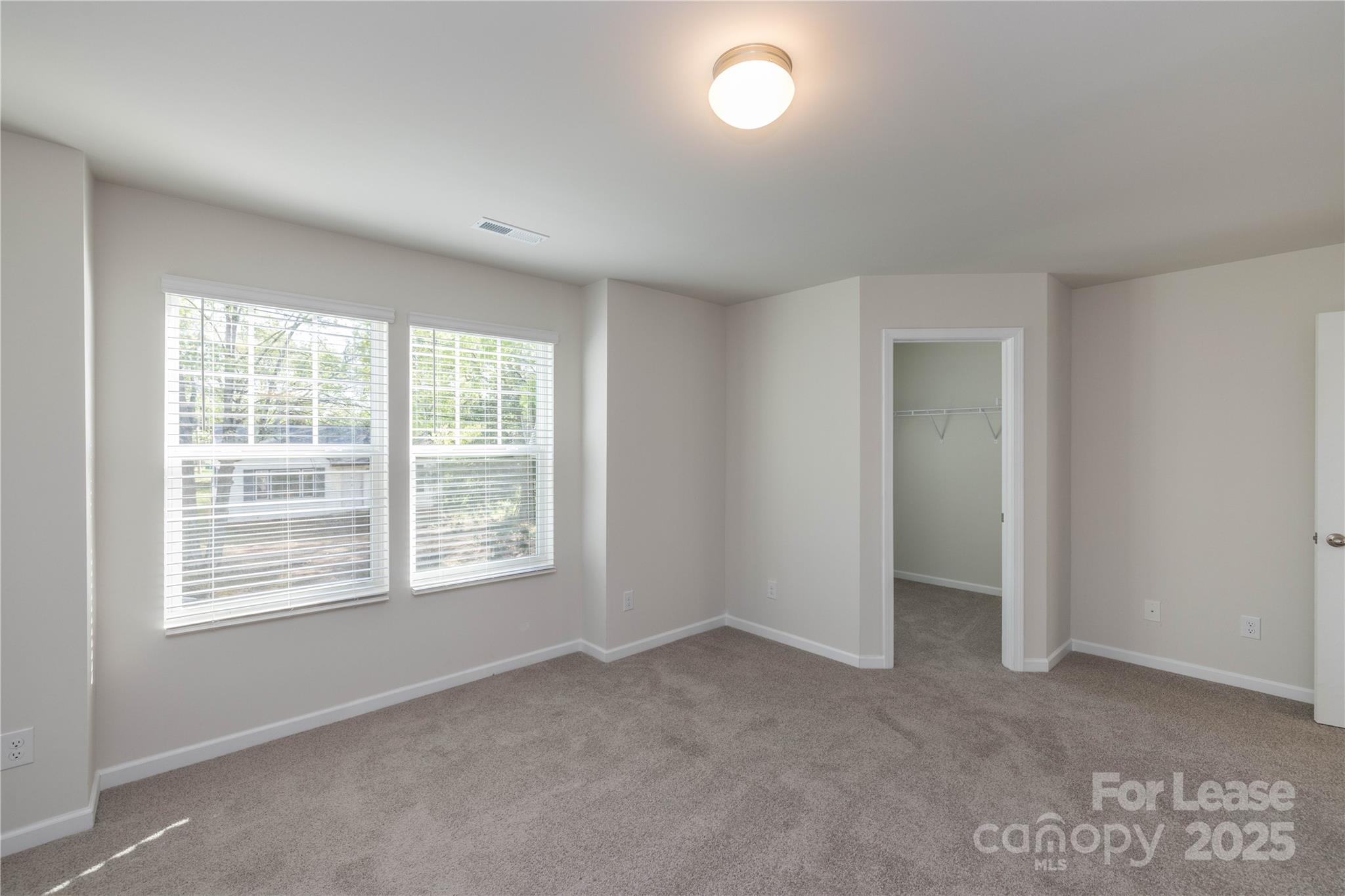 146 South Bell Avenue Albemarle, NC 28001 - Photo 22 of 36 an empty room with a window