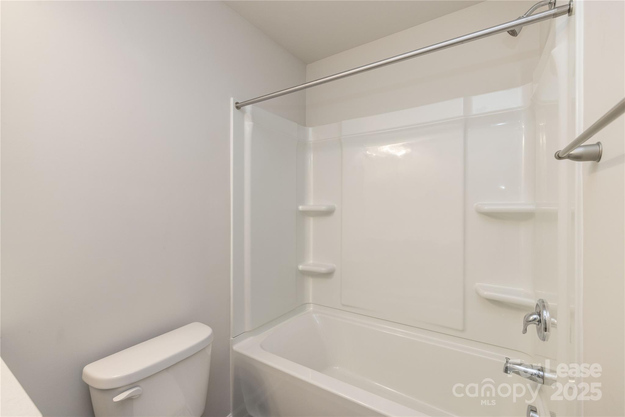 146 South Bell Avenue Albemarle, NC 28001 - Photo 24 of 36 a bathroom with a shower and a toilet