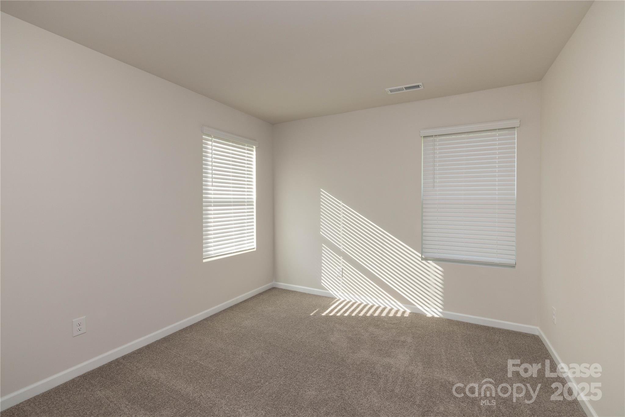 146 South Bell Avenue Albemarle, NC 28001 - Photo 27 of 36 a view of an empty room with a window