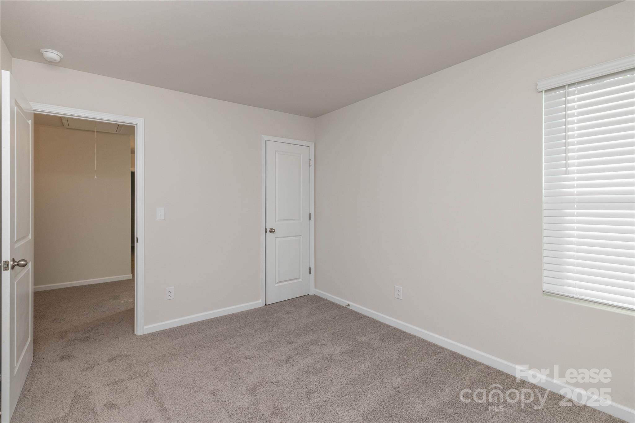 146 South Bell Avenue Albemarle, NC 28001 - Photo 28 of 36 an empty room with windows