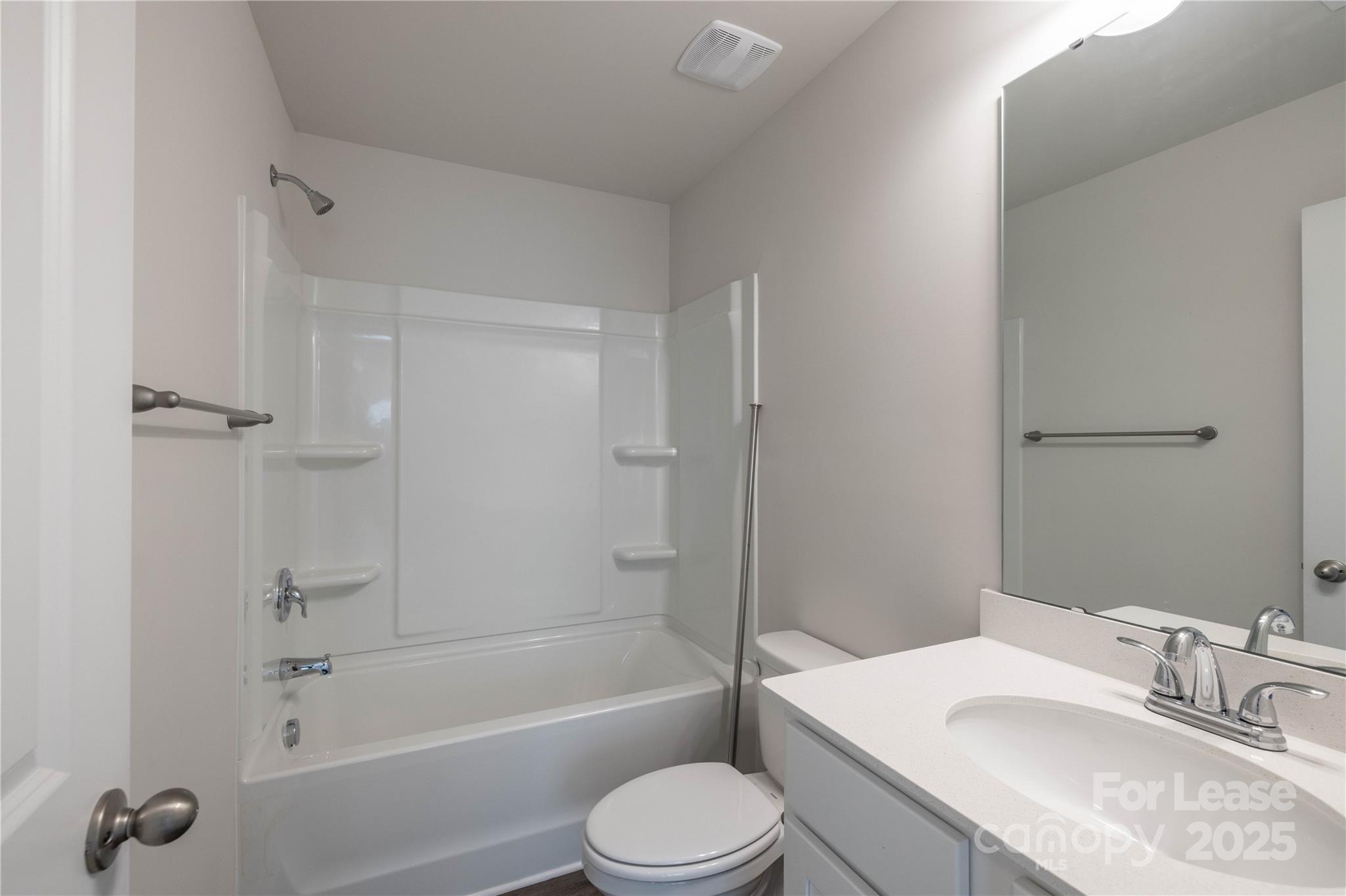 146 South Bell Avenue Albemarle, NC 28001 - Photo 29 of 36 a bathroom with a granite countertop sink toilet tub and shower