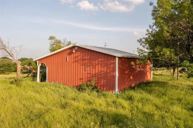 an aerial view of lake residential house with outdoor space