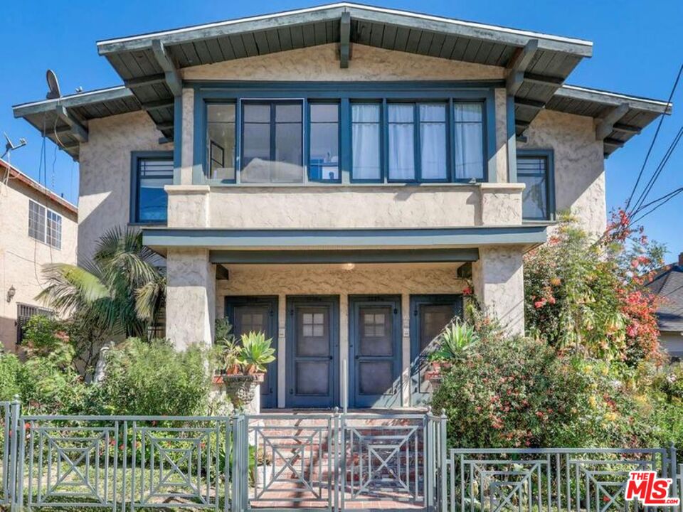 1126 Mohawk Street Los Angeles, CA 90026 - Photo 1 of 47 a front view of a house with garden