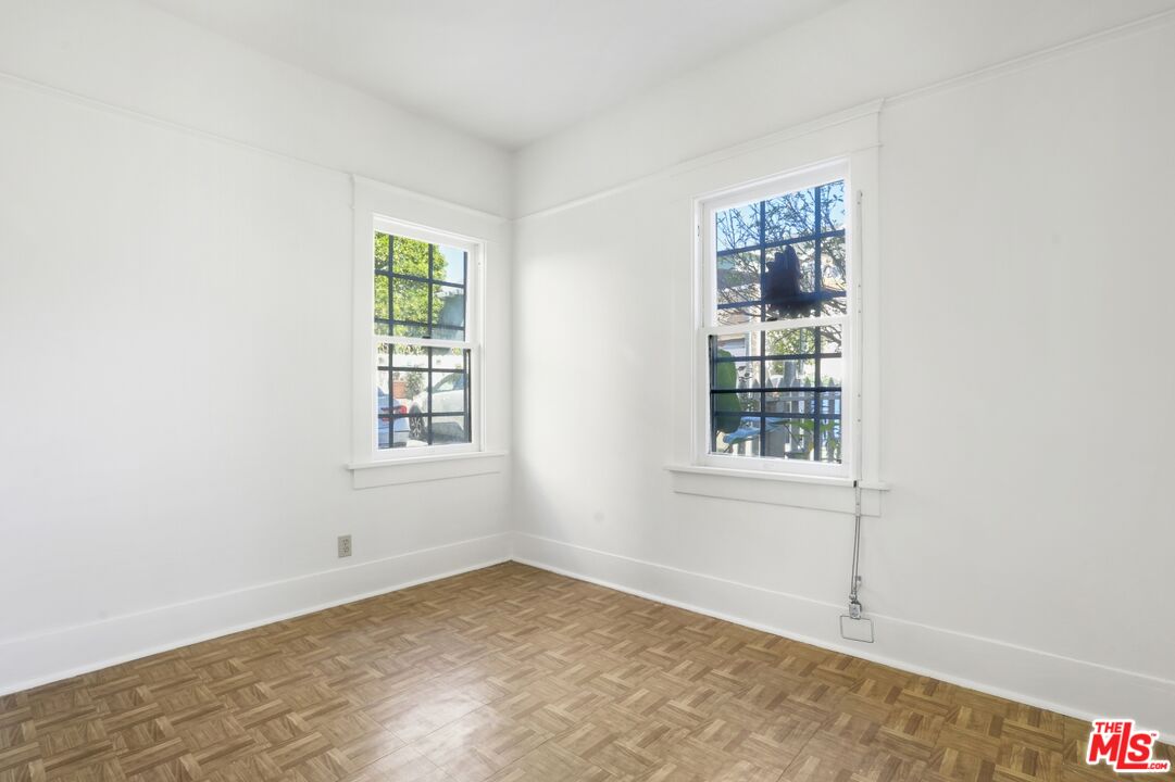 1126 Mohawk Street Los Angeles, CA 90026 - Photo 23 of 47 an empty room with windows