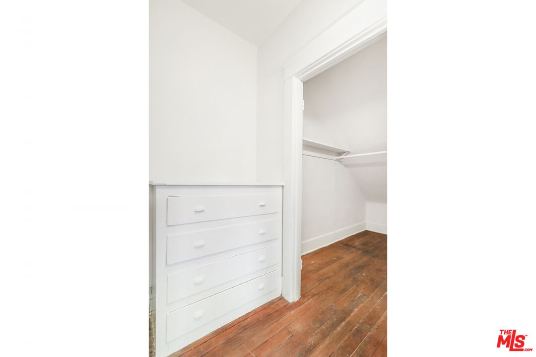 1126 Mohawk Street Los Angeles, CA 90026 - Photo 28 of 47 a view of a room with wooden floor