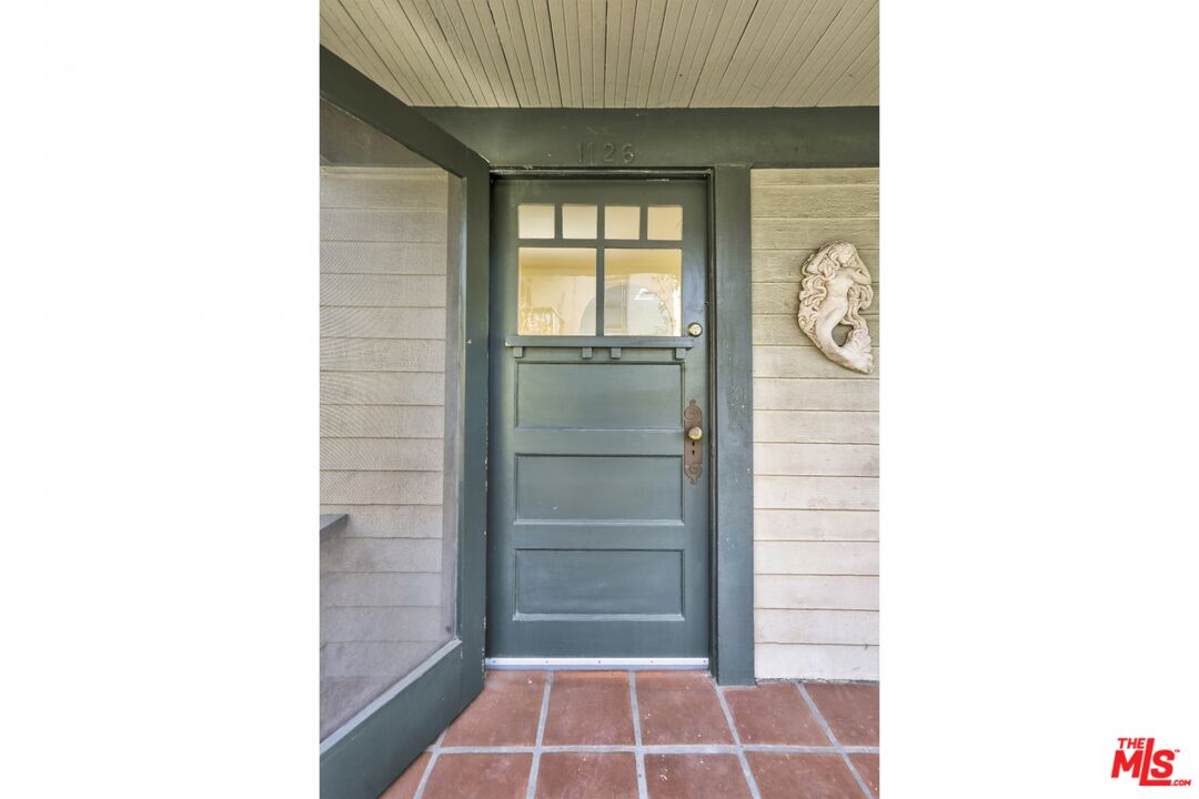 1126 Mohawk Street Los Angeles, CA 90026 - Photo 35 of 47 a picture of a bathroom with a sink and a window