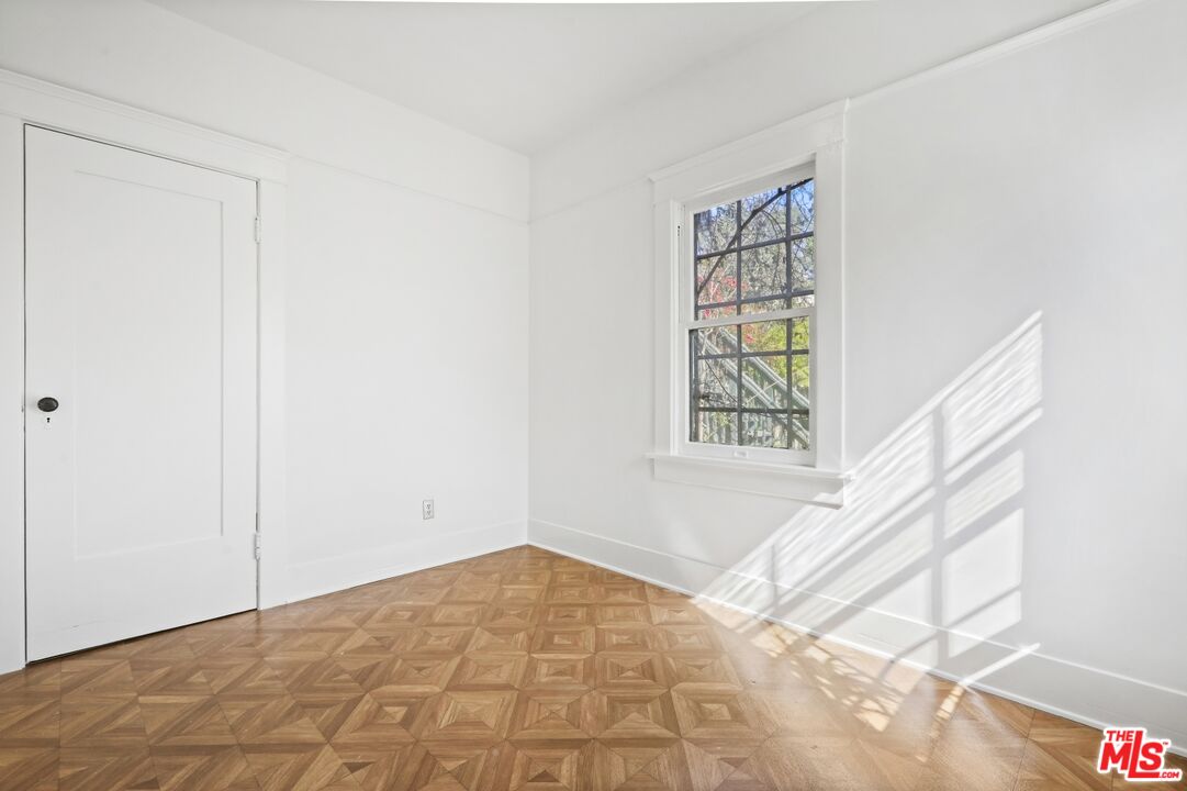 1126 Mohawk Street Los Angeles, CA 90026 - Photo 10 of 47 a view of an empty room with a window