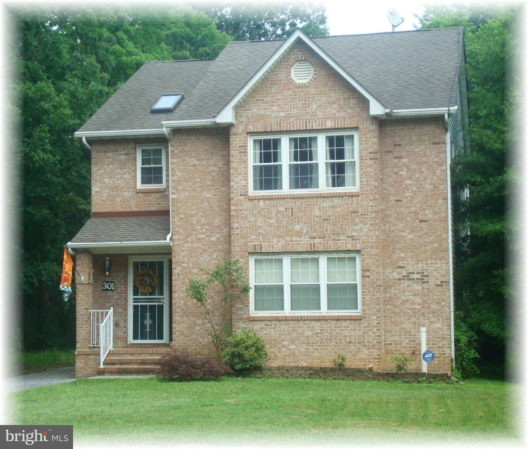 301 Bowleys Quarters Road Baltimore, MD 21220 - Photo 2 of 30 a front view of a house with a yard