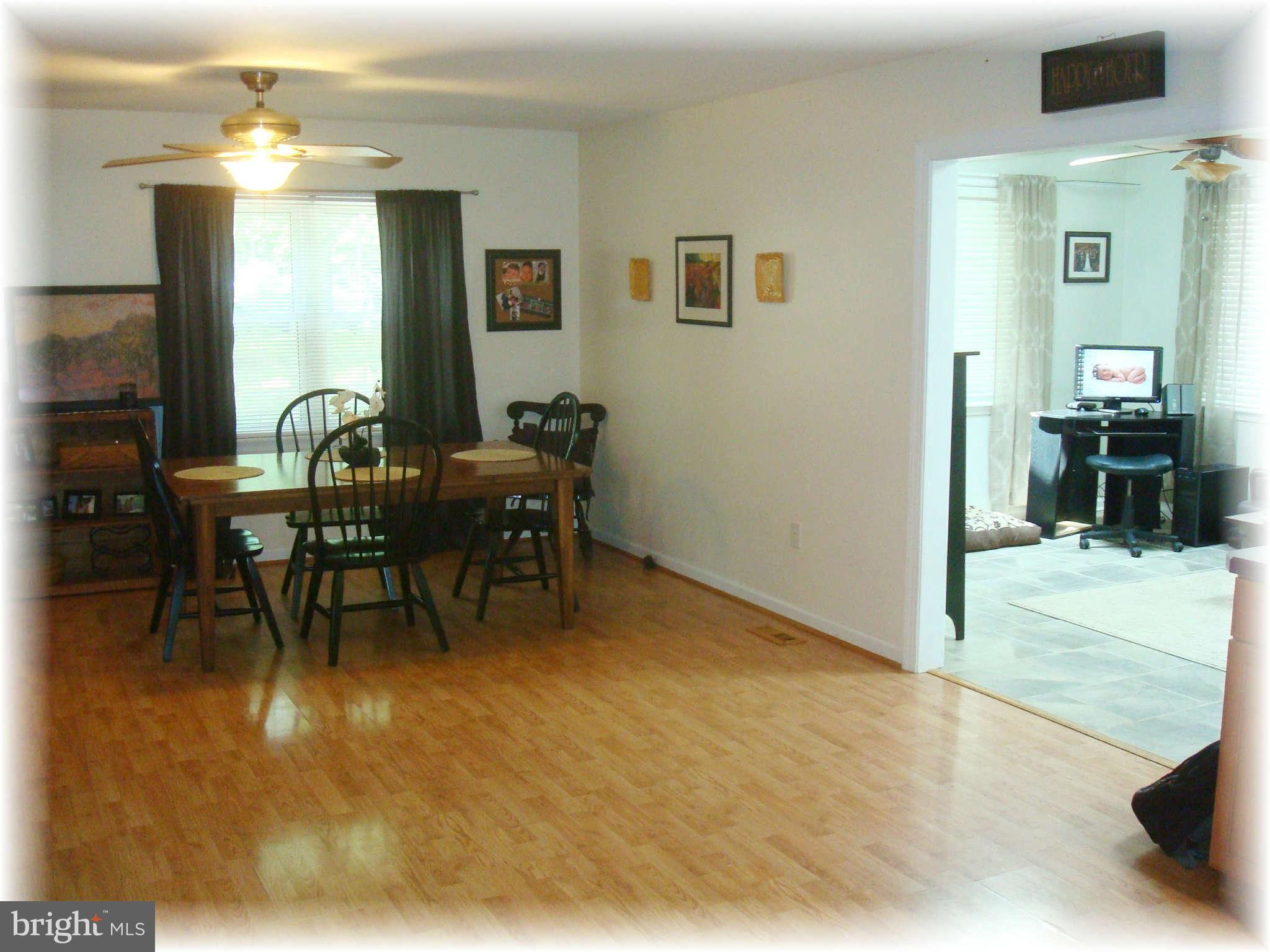 301 Bowleys Quarters Road Baltimore, MD 21220 - Photo 15 of 30 a view of a dining room with furniture