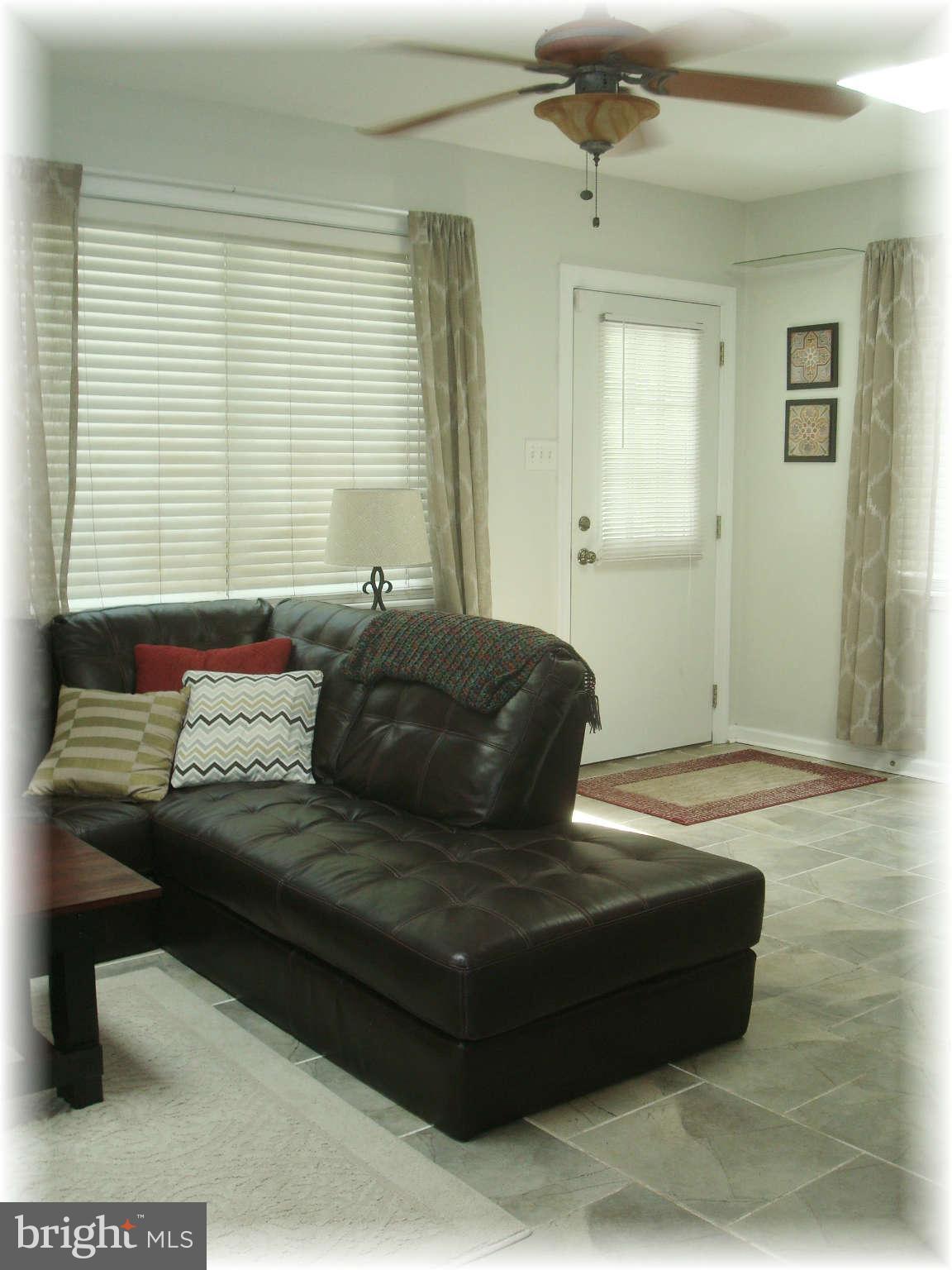 301 Bowleys Quarters Road Baltimore, MD 21220 - Photo 18 of 30 a living room with furniture and window