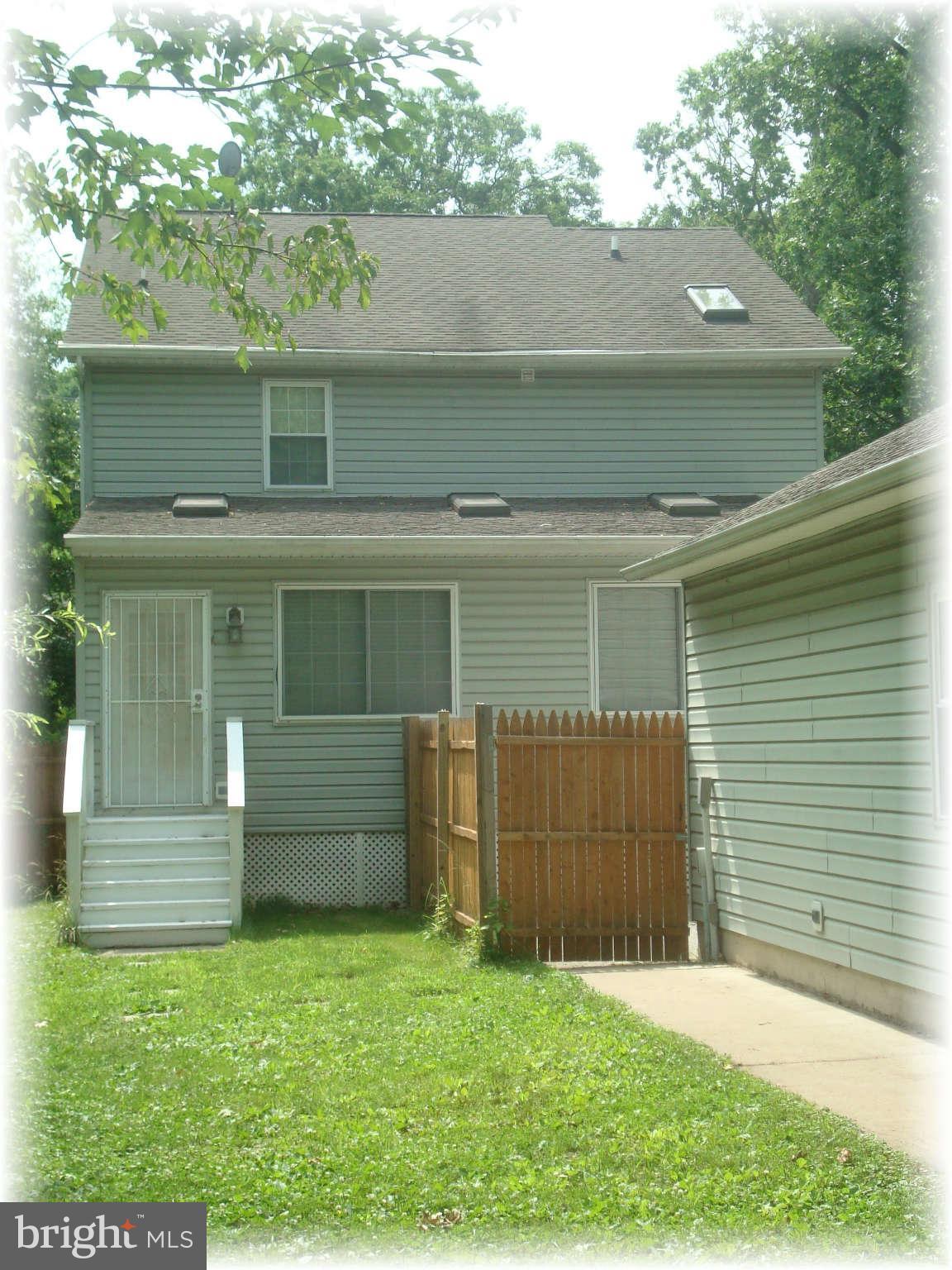 301 Bowleys Quarters Road Baltimore, MD 21220 - Photo 3 of 30 front view of a house with a yard