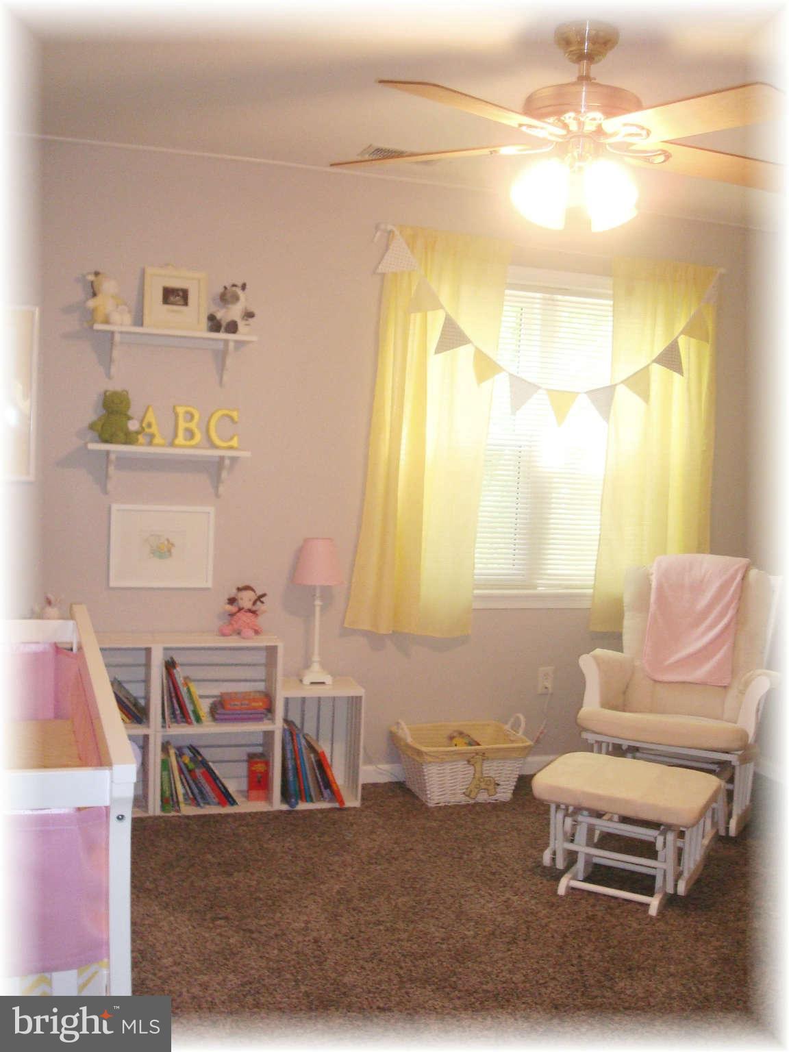 301 Bowleys Quarters Road Baltimore, MD 21220 - Photo 25 of 30 a living room with furniture and a window