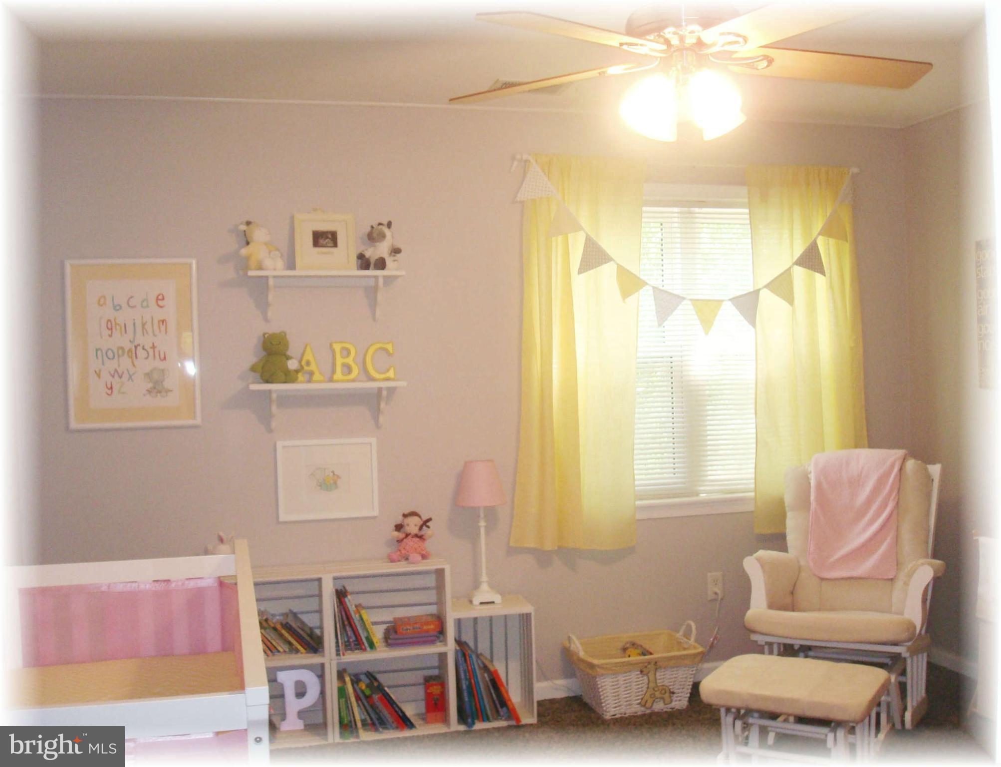 301 Bowleys Quarters Road Baltimore, MD 21220 - Photo 26 of 30 a living room with furniture and a large window