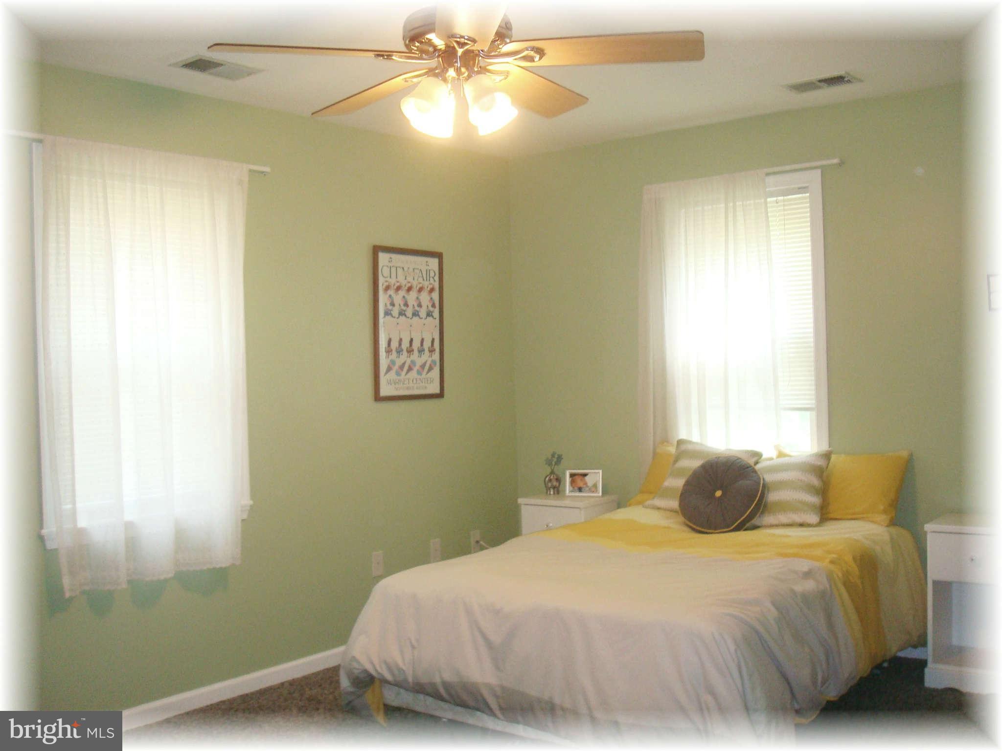 301 Bowleys Quarters Road Baltimore, MD 21220 - Photo 28 of 30 a bedroom with a bed and a window