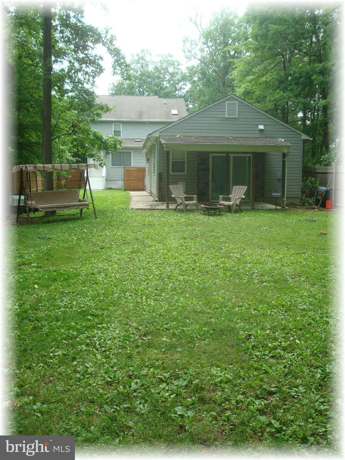 301 Bowleys Quarters Road Baltimore, MD 21220 - Photo 4 of 30 a front view of a house with a yard