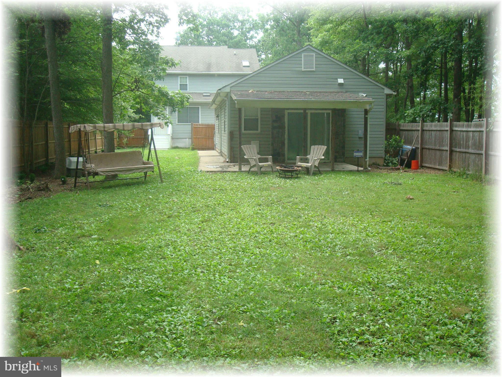 301 Bowleys Quarters Road Baltimore, MD 21220 - Photo 5 of 30 a front view of a house with garden