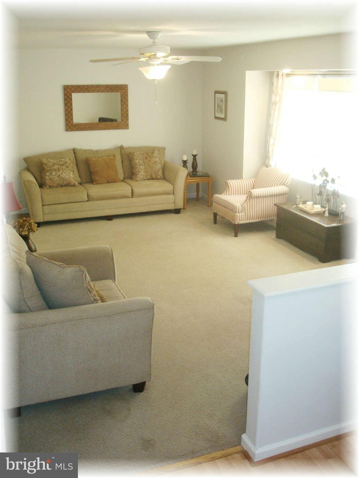 301 Bowleys Quarters Road Baltimore, MD 21220 - Photo 10 of 30 a living room with furniture and a window