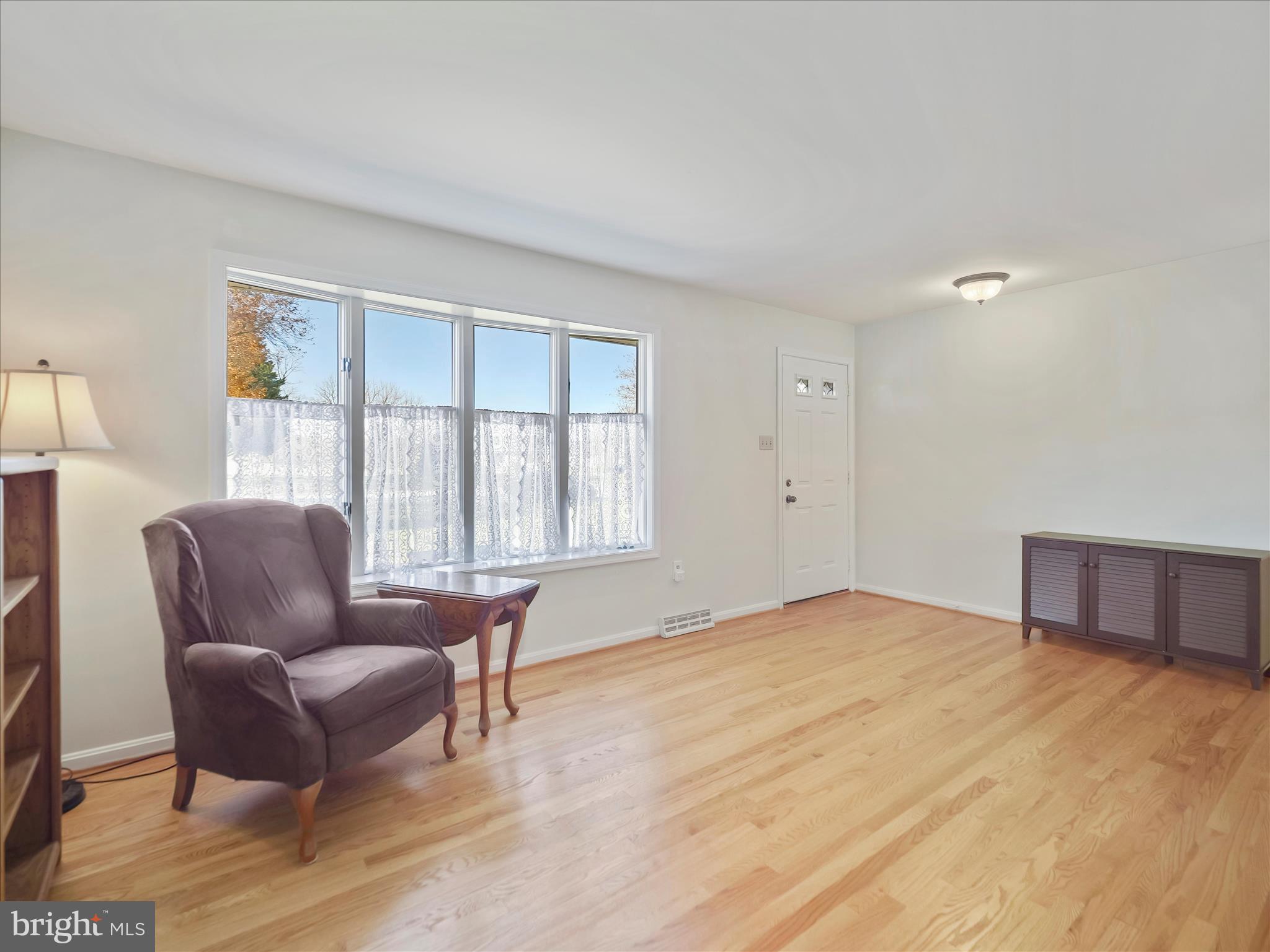 6527 Morningside Court Middletown, MD 21769 - Photo 13 of 42 a bedroom with a bed and wooden floor