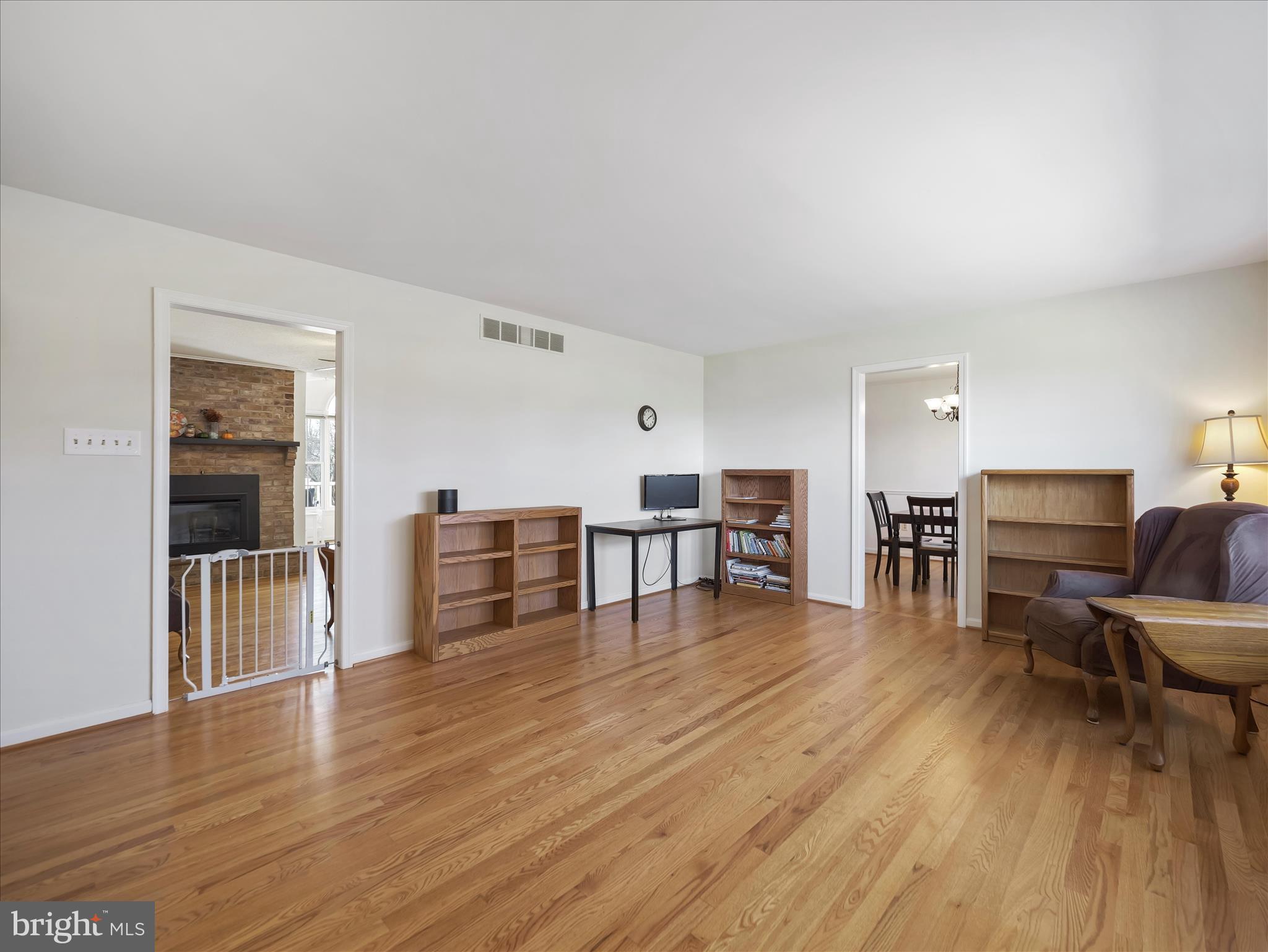 6527 Morningside Court Middletown, MD 21769 - Photo 14 of 42 a room with furniture and wooden floor