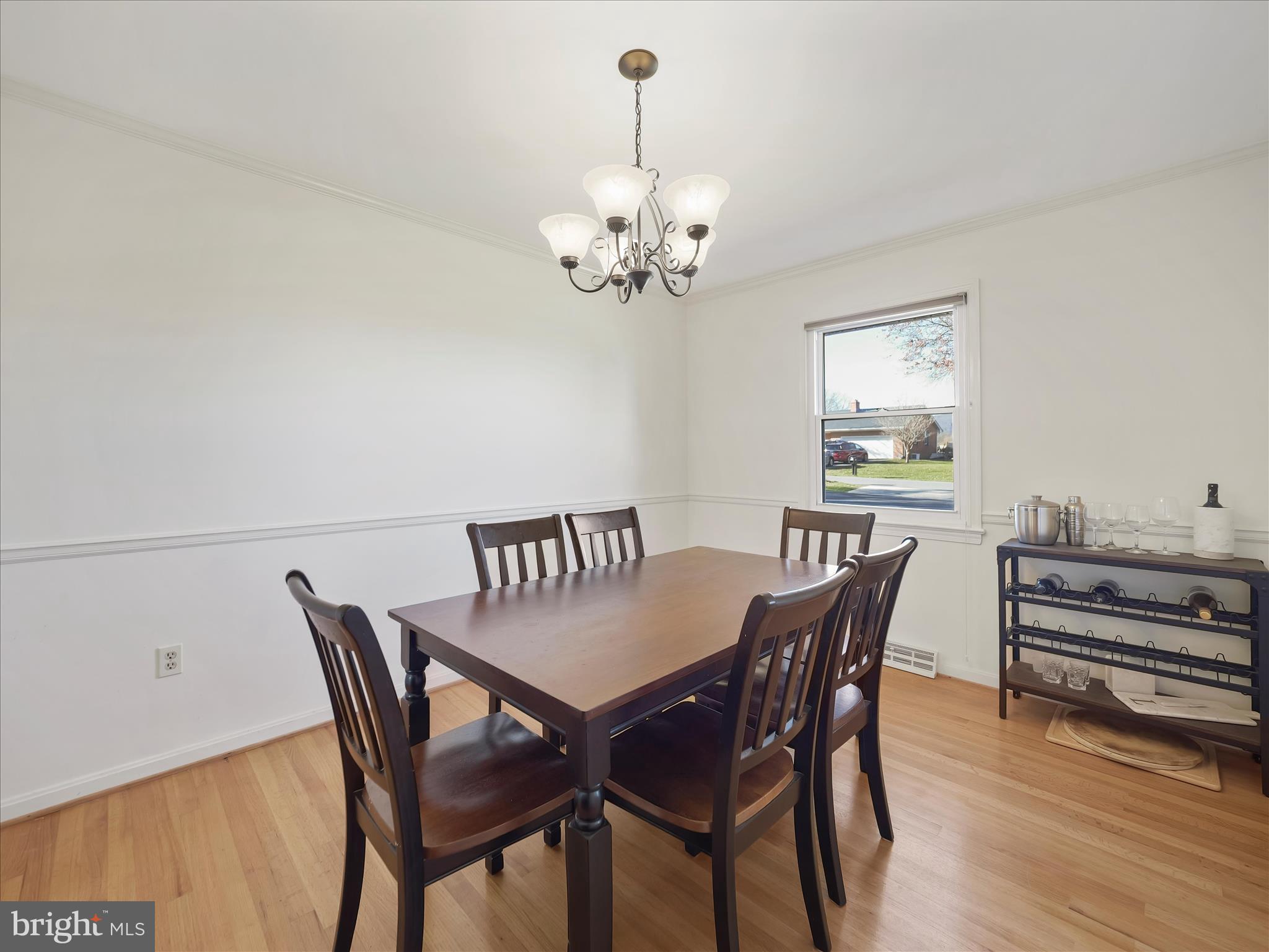 6527 Morningside Court Middletown, MD 21769 - Photo 16 of 42 a view of a dining room with furniture and wooden floor