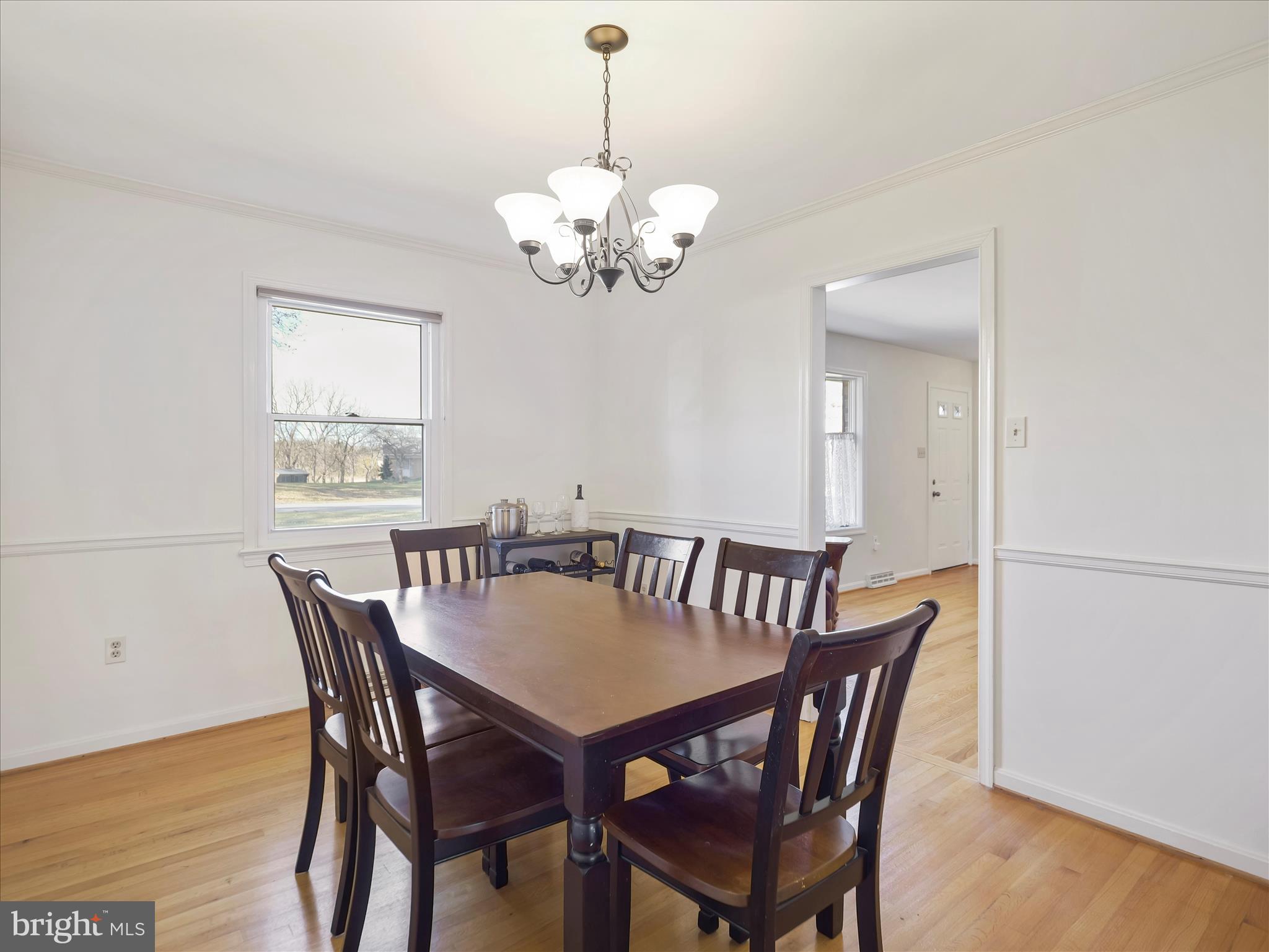 6527 Morningside Court Middletown, MD 21769 - Photo 17 of 42 a view of a dining room with furniture and wooden floor