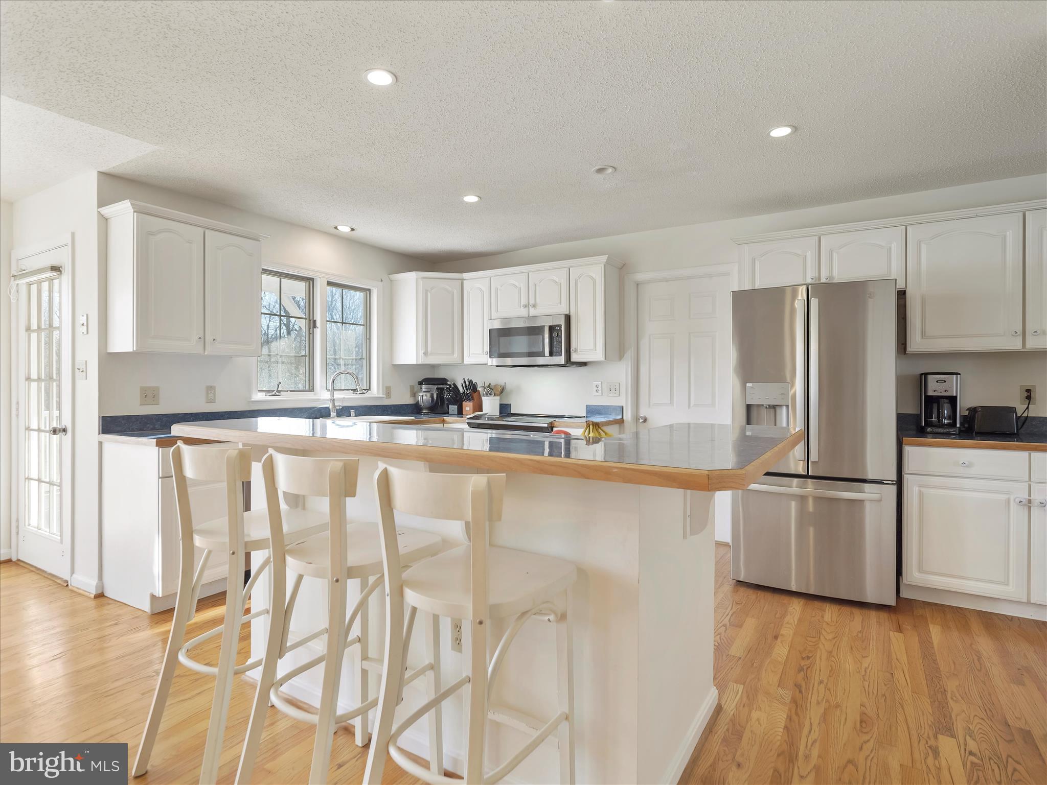 6527 Morningside Court Middletown, MD 21769 - Photo 22 of 42 a kitchen with stainless steel appliances granite countertop a refrigerator and a stove top oven