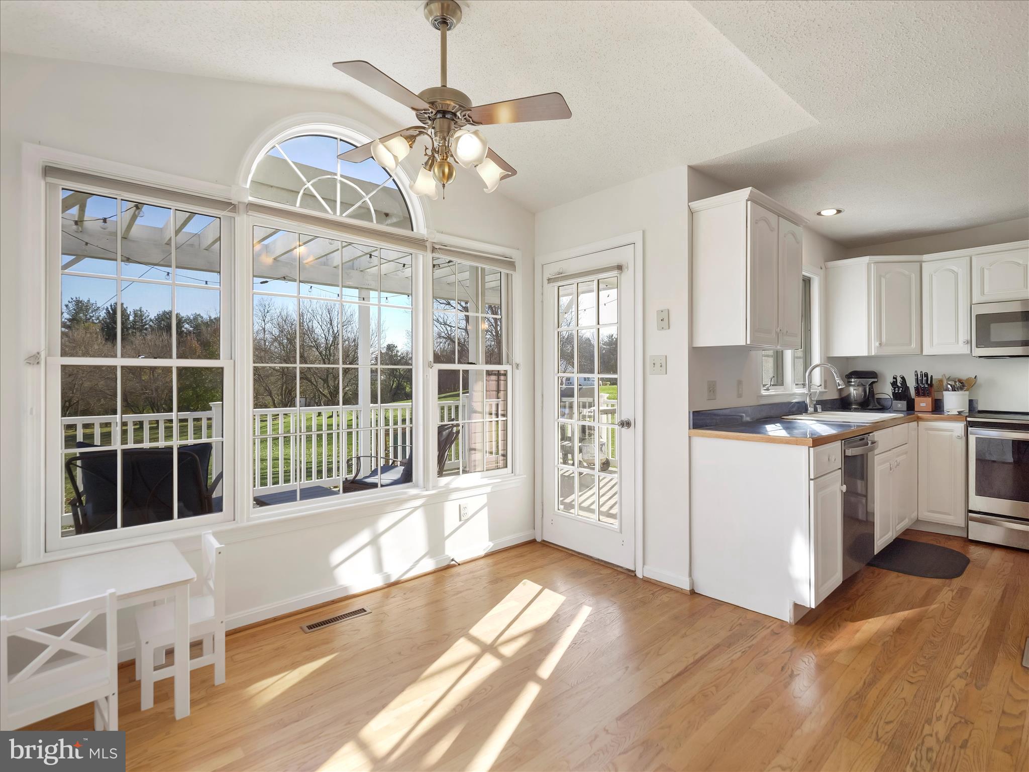 6527 Morningside Court Middletown, MD 21769 - Photo 24 of 42 a open kitchen with a large window appliances and cabinets