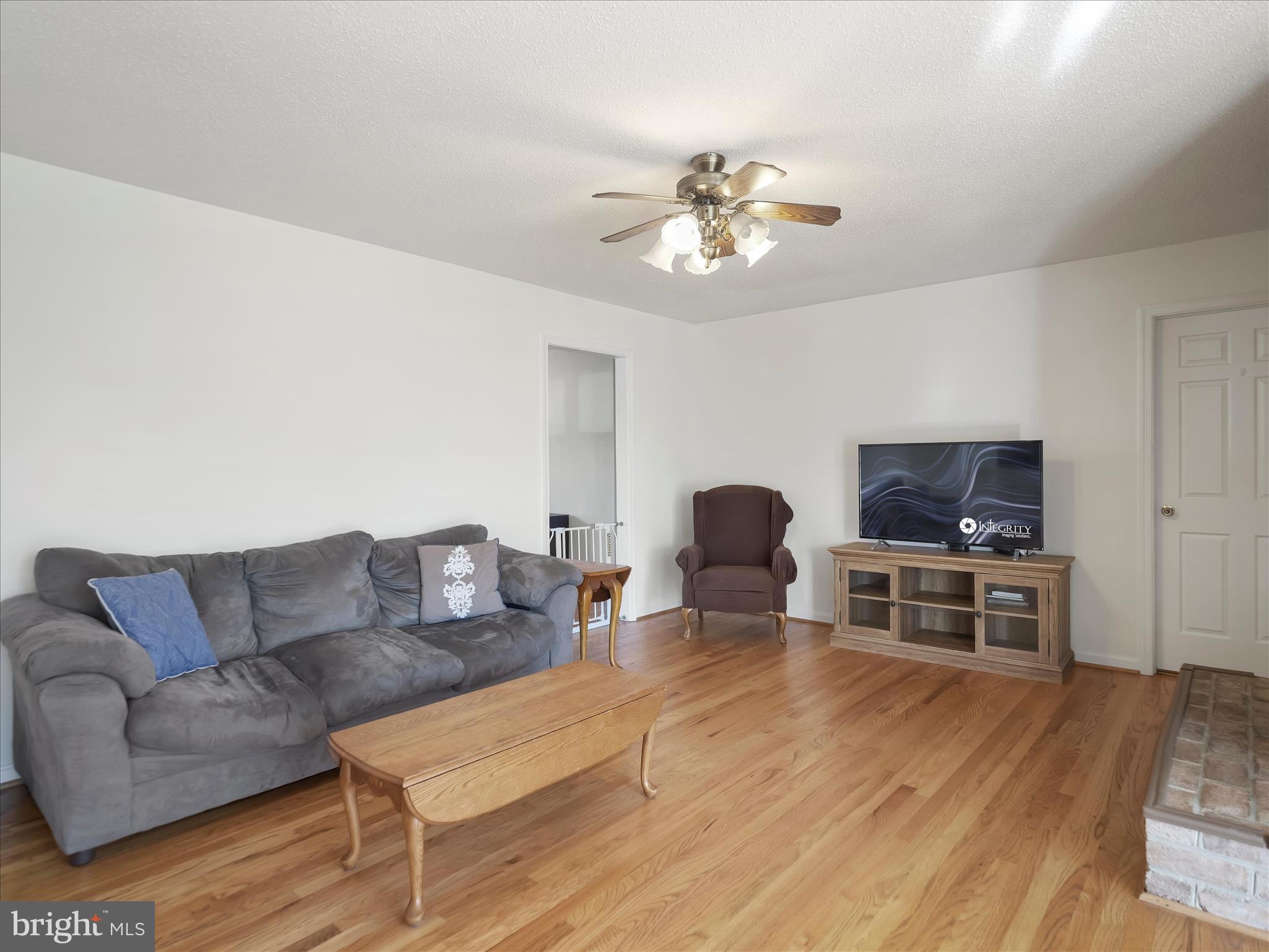 6527 Morningside Court Middletown, MD 21769 - Photo 27 of 42 a living room with furniture and a wooden floor