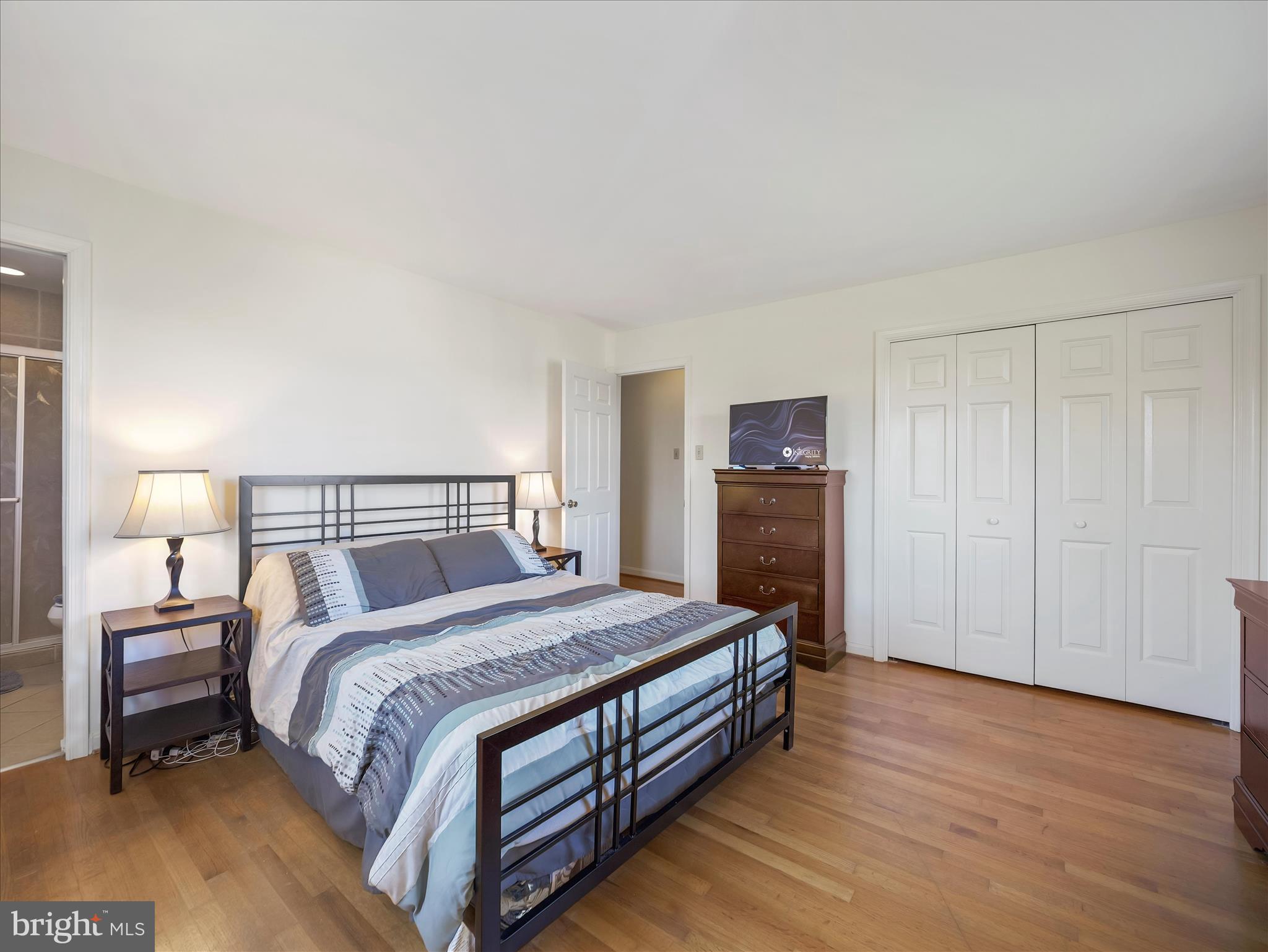 6527 Morningside Court Middletown, MD 21769 - Photo 31 of 42 a bed room with a bed and a night stand