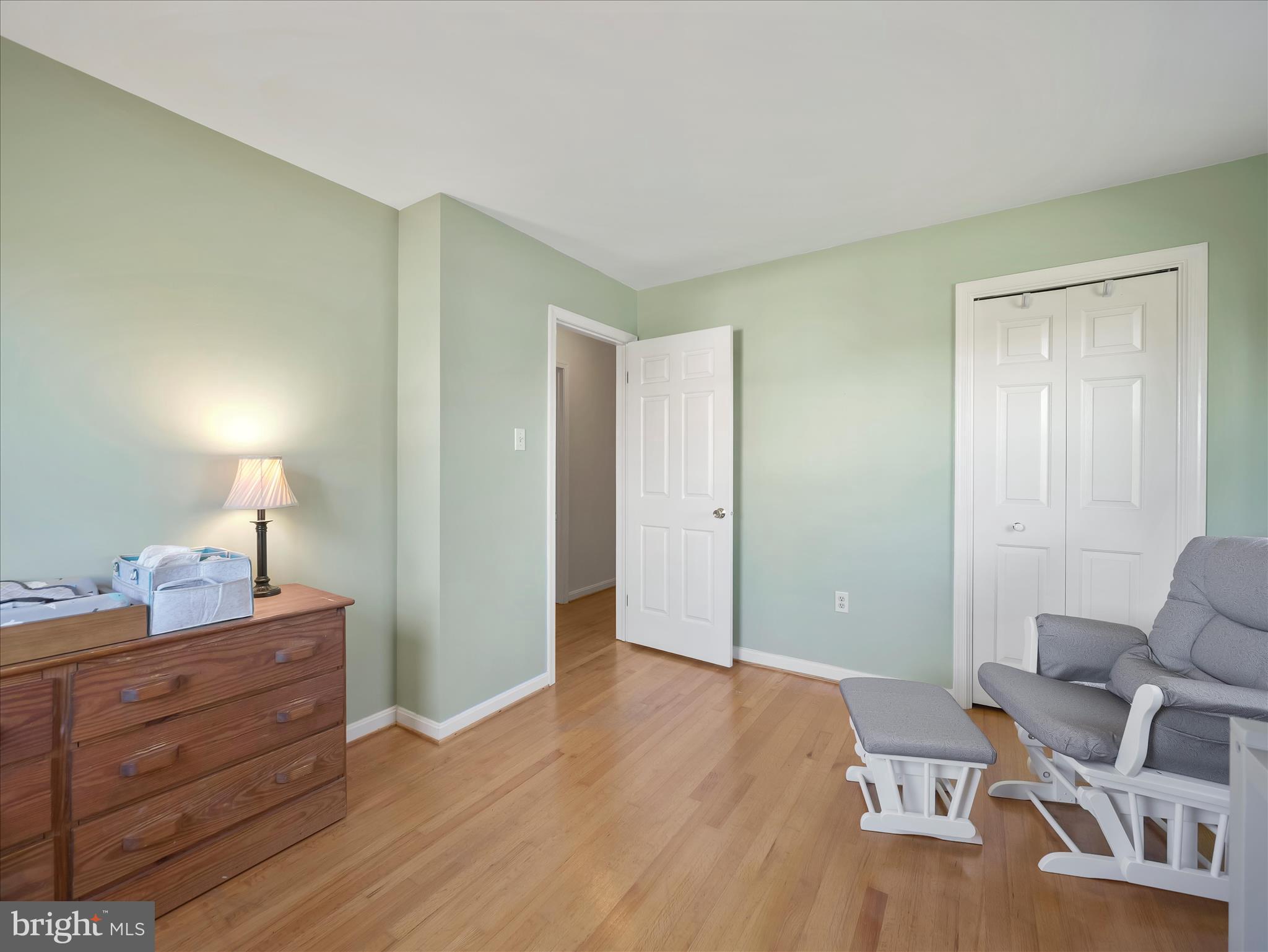 6527 Morningside Court Middletown, MD 21769 - Photo 34 of 42 a room that has a bed and a chair in it