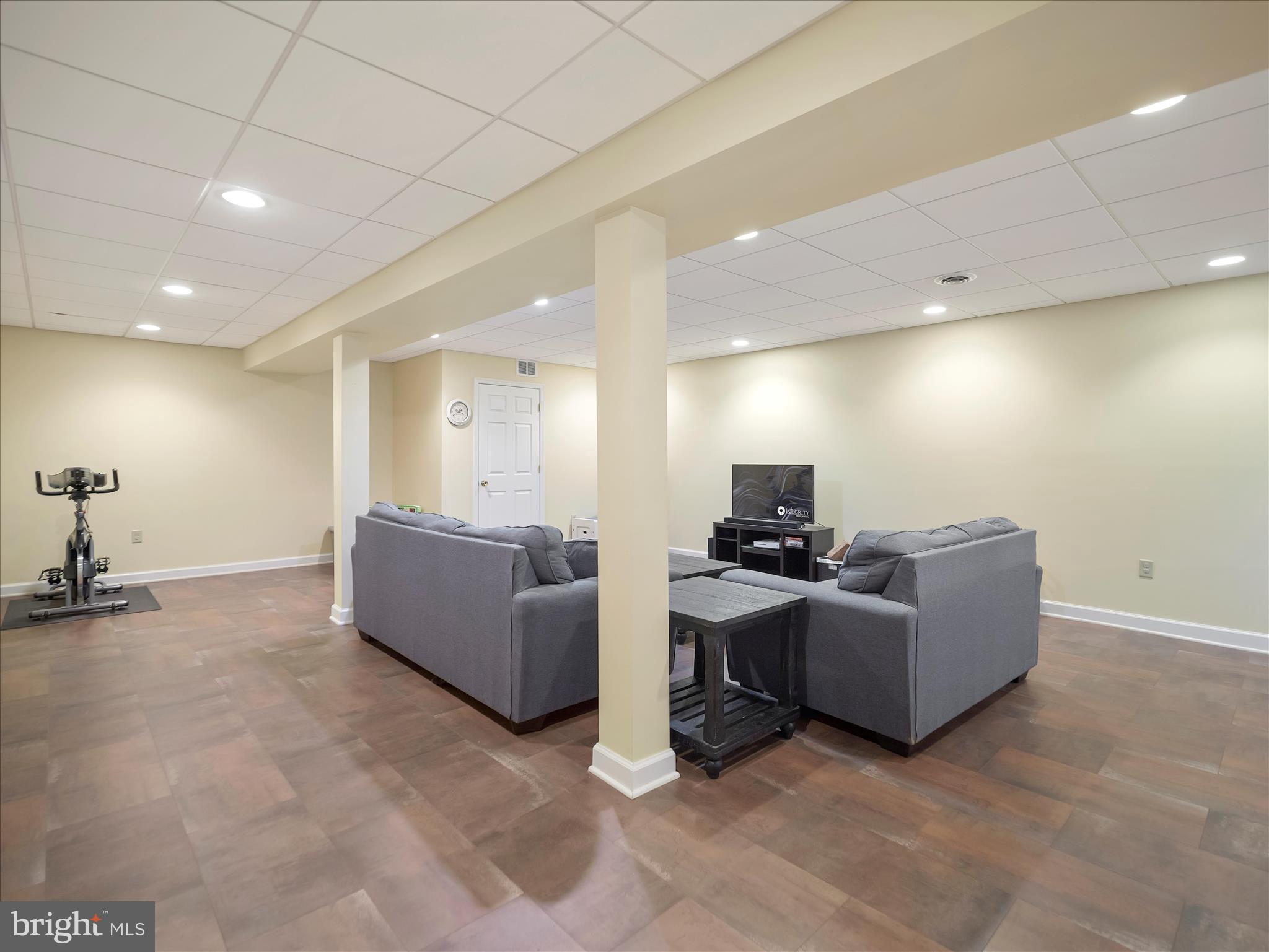 6527 Morningside Court Middletown, MD 21769 - Photo 39 of 42 a living room with couches and a flat screen tv