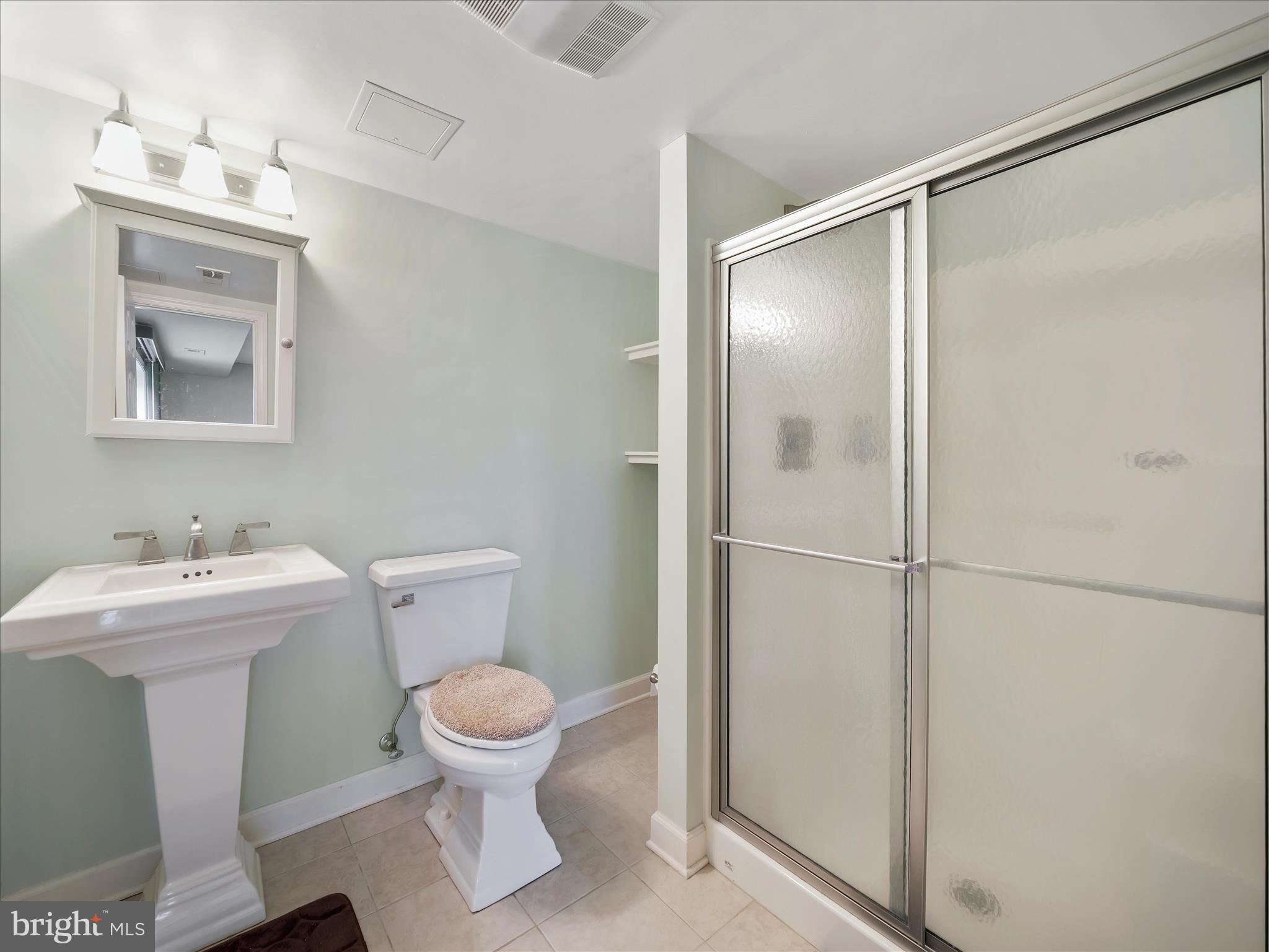 6527 Morningside Court Middletown, MD 21769 - Photo 42 of 42 a bathroom with a sink toilet and a mirror