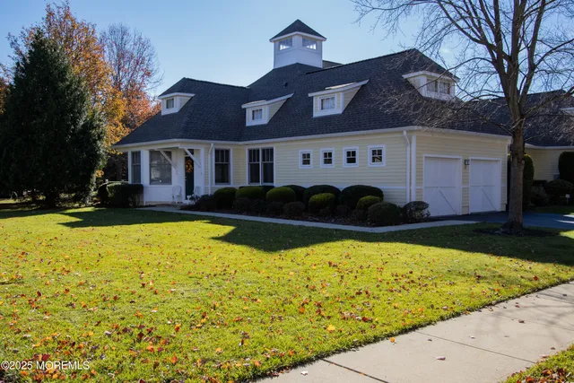a view of a house with swimming pool