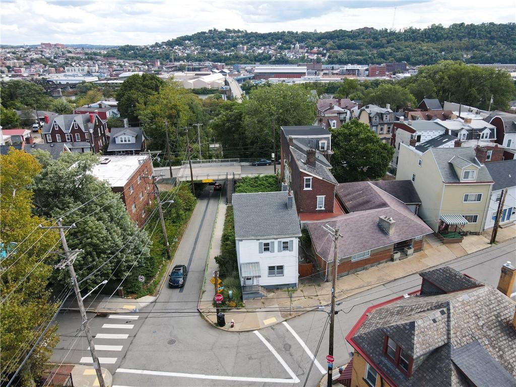 1845 Ley Street Pittsburgh, PA 15212 - Photo 37 of 41 an aerial view of a house with a lake view