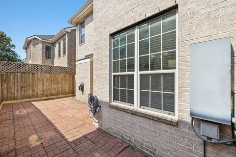a view of a house with a large window