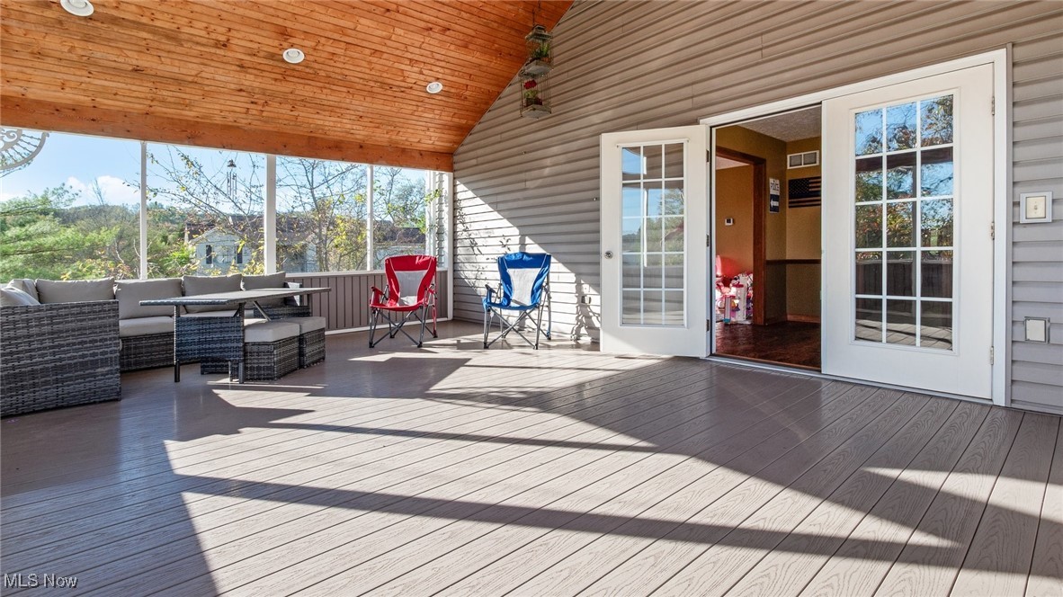 62960 James Road Cambridge, OH 43725 - Photo 29 of 40 Wooden deck featuring an outdoor hangout area off of Main level