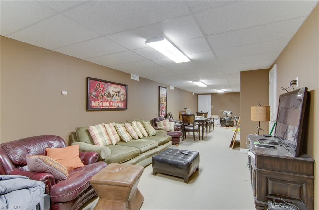 205 Shadow Valley Road High Point, NC 27262 - Photo 19 of 30 Finished basement with Endless Possibilities!